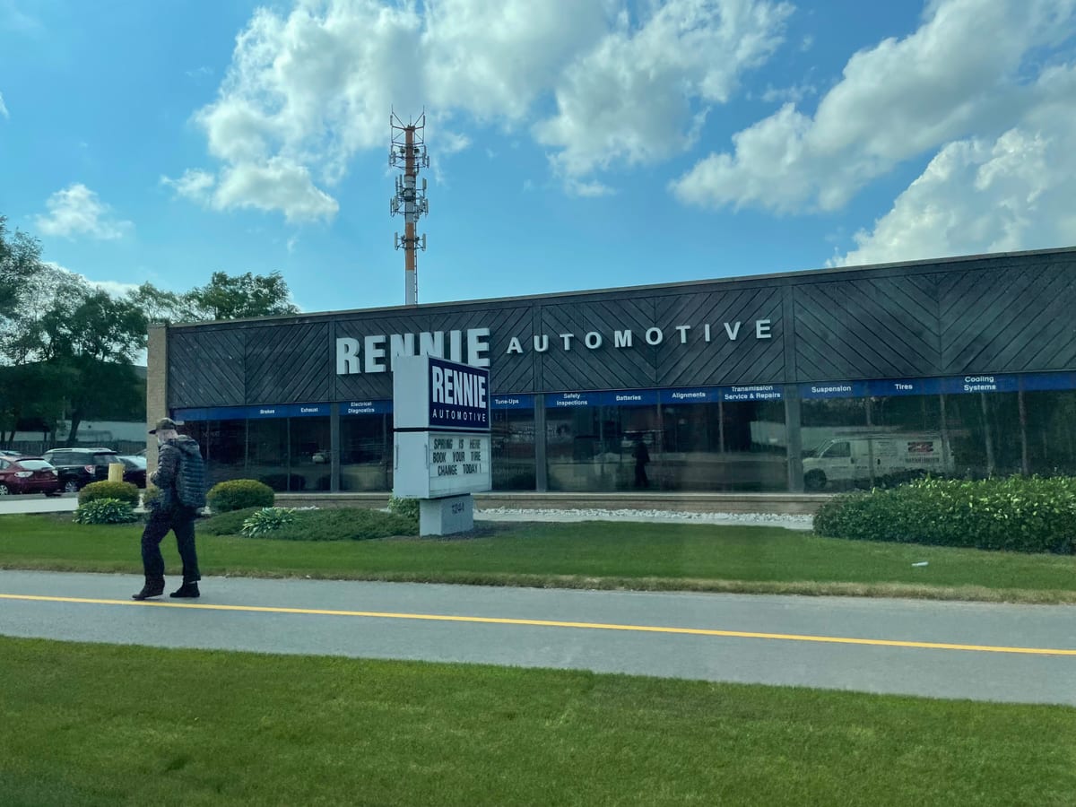 The Rennie Automotive building on Victoria Street North, the name in large letters on a dark fascia above the service windows